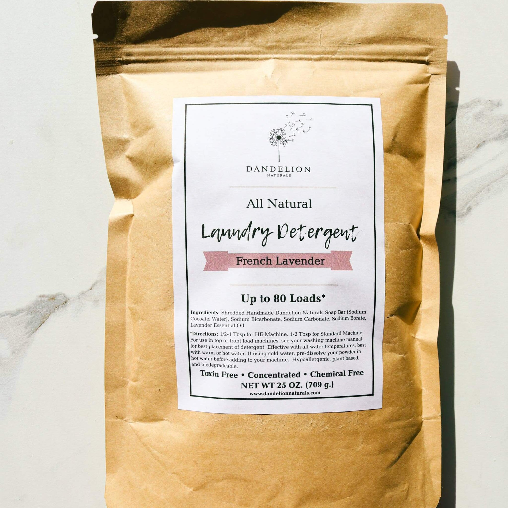 Non toxic laundry detergent in lavender scent in a resealable brown bag.