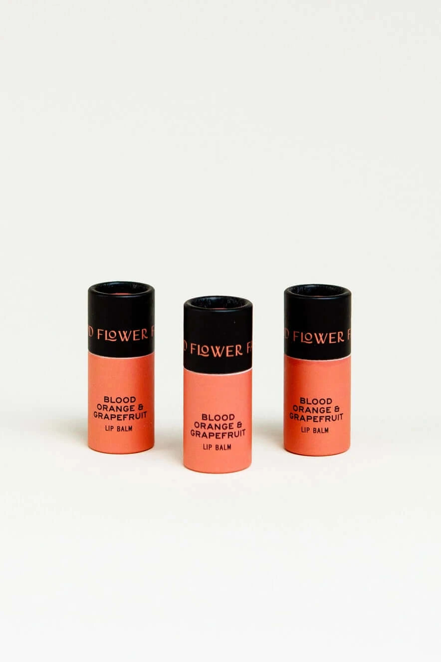 3 organic lip balms with biodegradable containers in blood orange and grapefuit