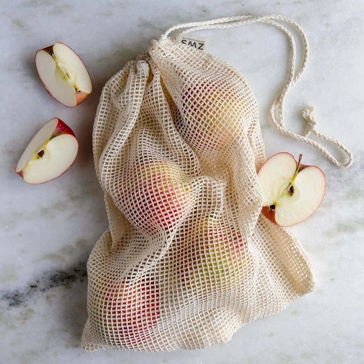 large organic cotton produce bag with apples inside