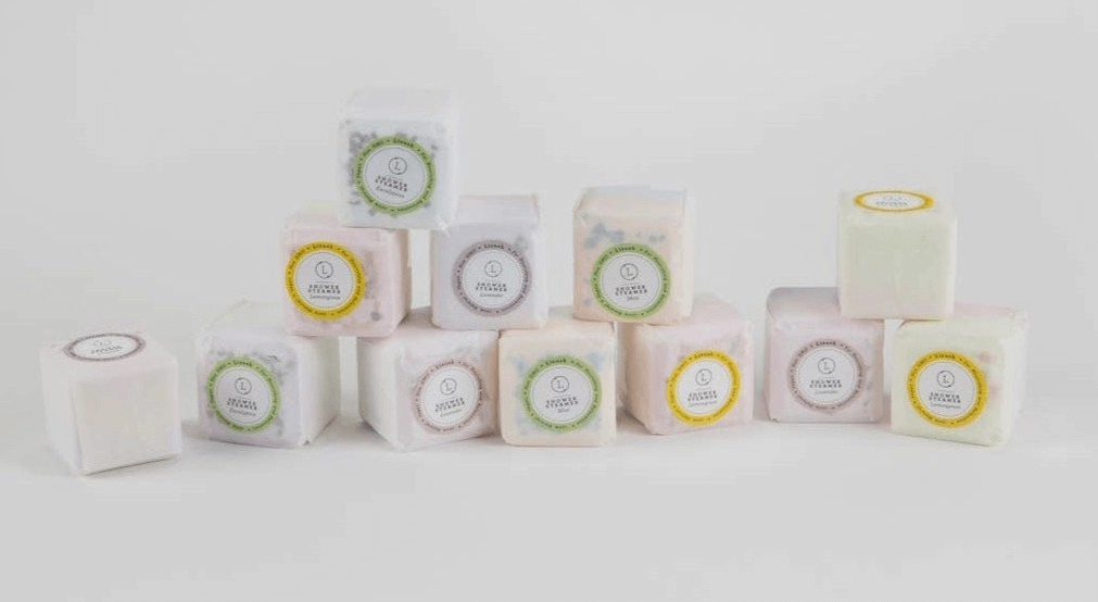 packaged shower steamers in mint, eucalyptus, grapefruit and lavender 